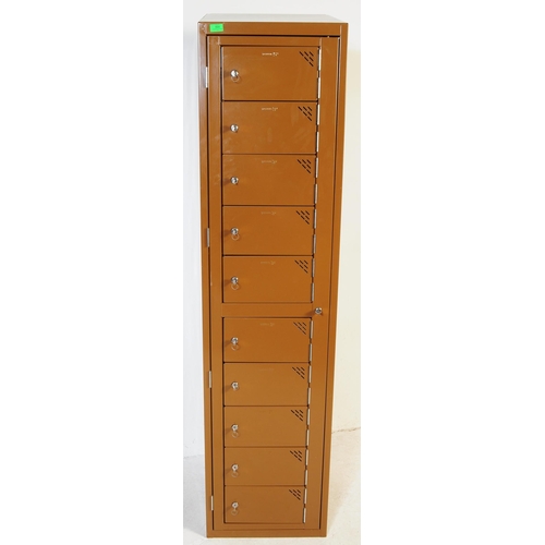 604 - A contemporary Sperrin SP upright metal pedestal locker cabinet. Industrial form with brown enamel p... 