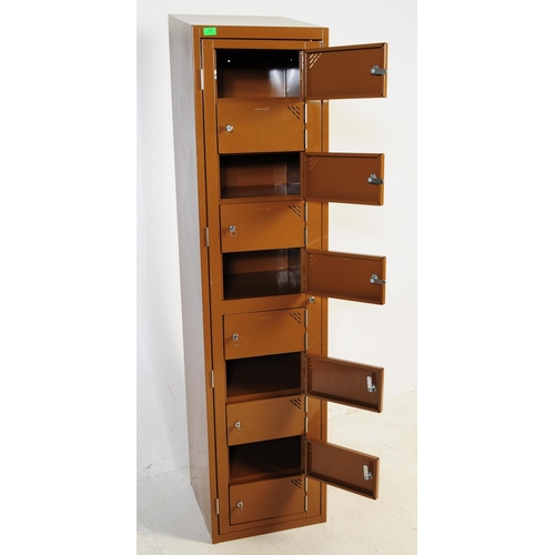 604 - A contemporary Sperrin SP upright metal pedestal locker cabinet. Industrial form with brown enamel p... 
