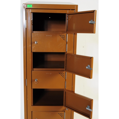 604 - A contemporary Sperrin SP upright metal pedestal locker cabinet. Industrial form with brown enamel p... 