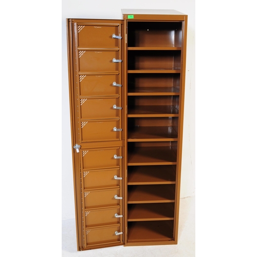 604 - A contemporary Sperrin SP upright metal pedestal locker cabinet. Industrial form with brown enamel p... 