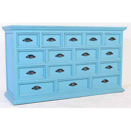 605 - A contemporary large painted merchants double chest of drawers. The large painted painted pine body ... 
