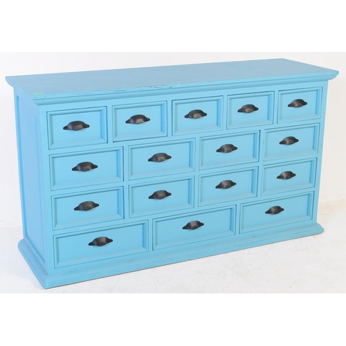 605 - A contemporary large painted merchants double chest of drawers. The large painted painted pine body ... 
