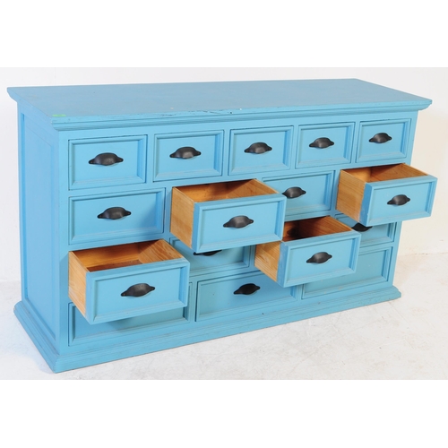 605 - A contemporary large painted merchants double chest of drawers. The large painted painted pine body ... 