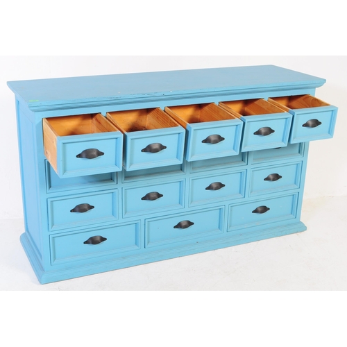 605 - A contemporary large painted merchants double chest of drawers. The large painted painted pine body ... 