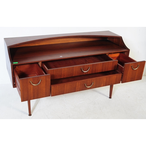 612 - Meredew - A retro mid 20th century circa 1970s afromosia teak sideboard. The credenza having shelved... 