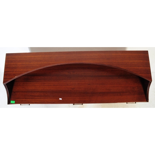 612 - Meredew - A retro mid 20th century circa 1970s afromosia teak sideboard. The credenza having shelved... 