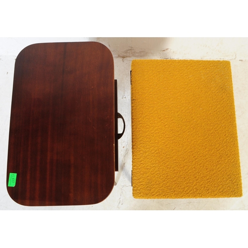 617 - Two mid 20th century retro teak sewing tables. To include example upholstered in a mustard moquette ... 