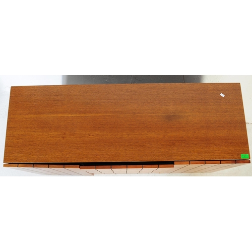 624 - A 20th century Italian mid 20th century living room suite comprising of two sideboardS and an accomp... 