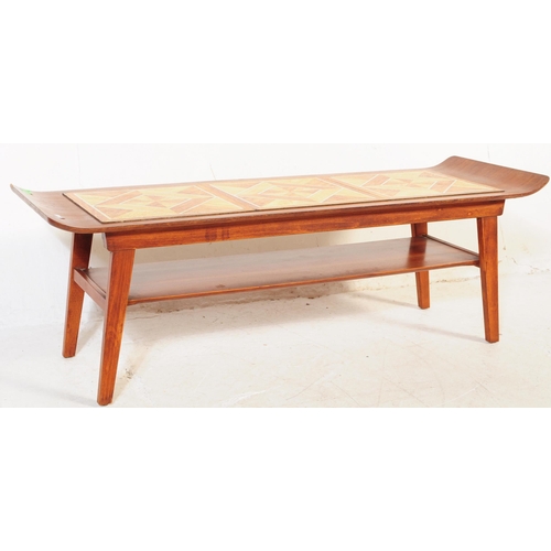 625 - Two retro mid 20th century teak coffee tables / occasional tables to include a drop leaf example alo... 