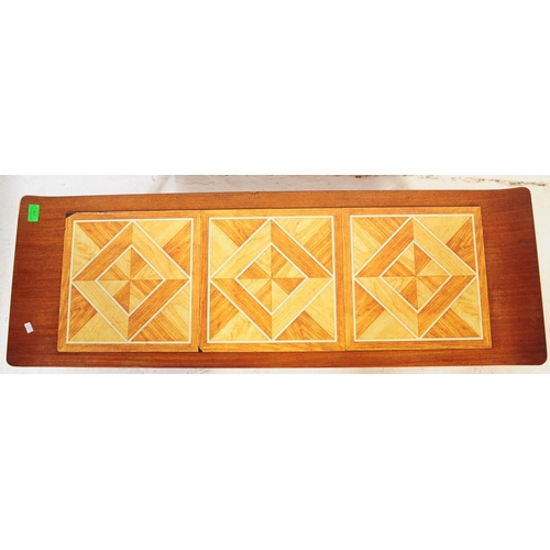 625 - Two retro mid 20th century teak coffee tables / occasional tables to include a drop leaf example alo... 