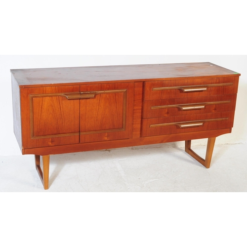 627 - British Modern Design - A retro mid 20th century teak sideboard. The sideboard having a bank of thre... 