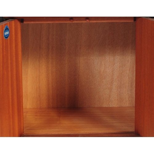 644 - Nathan - A 1960's mid 20th Century teak wood bedside chest / side lamp table by Nathan. Of simple fo... 