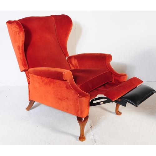 653 - Parker Knoll - Two retro mid 20th century Parker Knoll wing back armchairs upholstered in a red velv... 