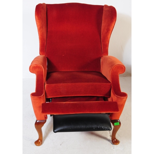653 - Parker Knoll - Two retro mid 20th century Parker Knoll wing back armchairs upholstered in a red velv... 