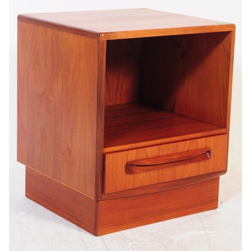 658 - A 1970's mid century teak wood bedside cabinet. Being raised on pedestal form having a single drawer... 