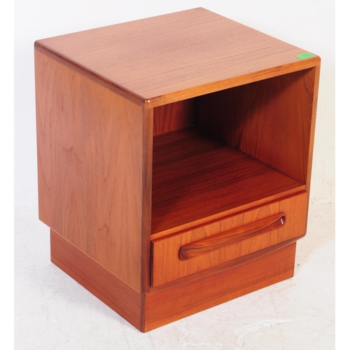 658 - A 1970's mid century teak wood bedside cabinet. Being raised on pedestal form having a single drawer... 