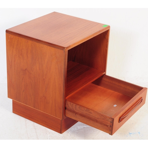 658 - A 1970's mid century teak wood bedside cabinet. Being raised on pedestal form having a single drawer... 