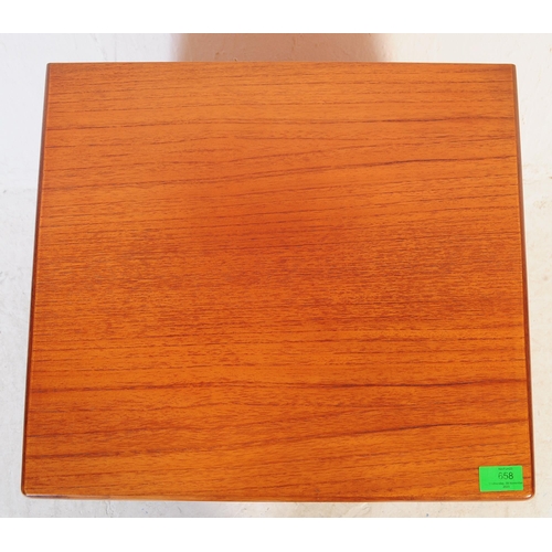 658 - A 1970's mid century teak wood bedside cabinet. Being raised on pedestal form having a single drawer... 