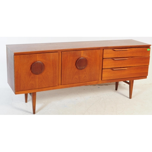 671 - A retro mid 20th century teak sideboard credenza by Beautility. Of rectangular form with a bank of t... 