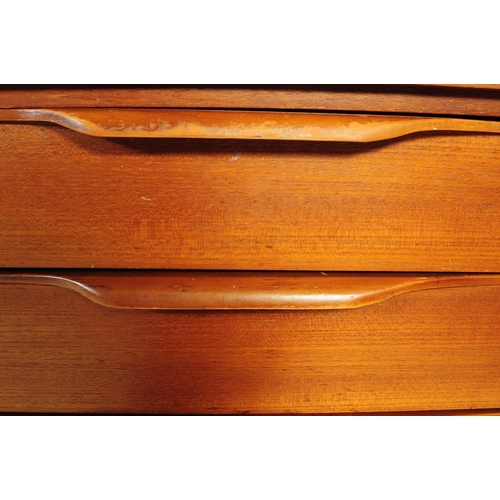 671 - A retro mid 20th century teak sideboard credenza by Beautility. Of rectangular form with a bank of t... 