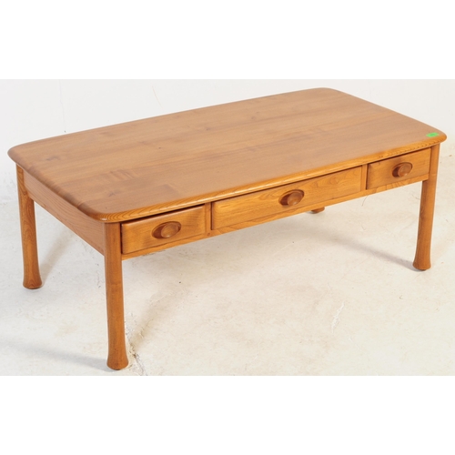 679 - Ercol - Windsor - A retro mid 20th century circa 1960s blond elm occasional coffee table. The table ... 
