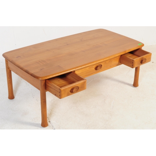 679 - Ercol - Windsor - A retro mid 20th century circa 1960s blond elm occasional coffee table. The table ... 