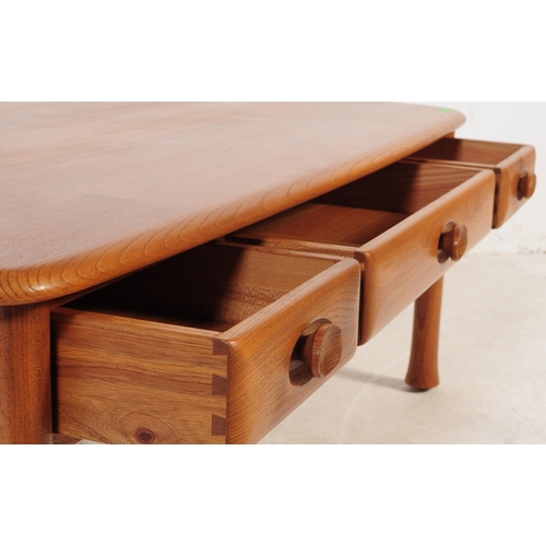 679 - Ercol - Windsor - A retro mid 20th century circa 1960s blond elm occasional coffee table. The table ... 