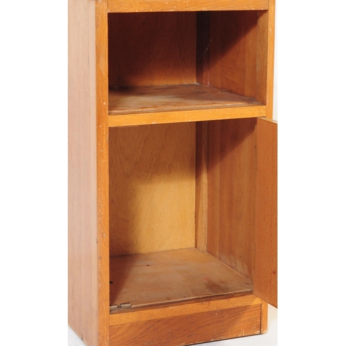 680 - British Modern Design - A pair of mid 20th century circa 1950s post-war teak bedside cabinets raised... 