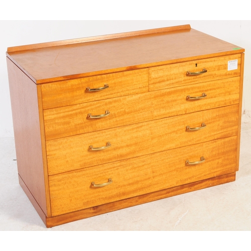 682 - British Modern Design - A mid 20th century circa 1960s teak chest of drawers. The chest of drawers h... 