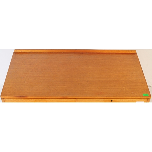 682 - British Modern Design - A mid 20th century circa 1960s teak chest of drawers. The chest of drawers h... 