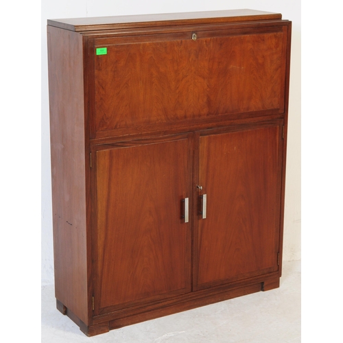 685 - British Modern Design - A retro mid 20th century teak circa 1960s student bureau. The bureau having ... 