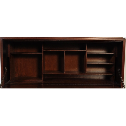 685 - British Modern Design - A retro mid 20th century teak circa 1960s student bureau. The bureau having ... 