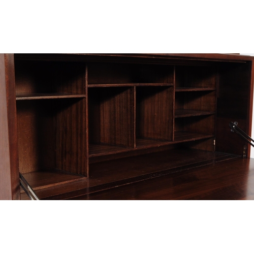 685 - British Modern Design - A retro mid 20th century teak circa 1960s student bureau. The bureau having ... 