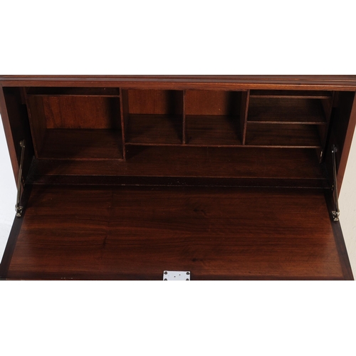 685 - British Modern Design - A retro mid 20th century teak circa 1960s student bureau. The bureau having ... 
