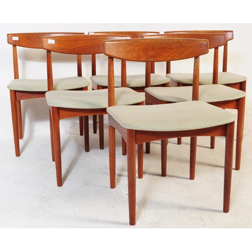 688 - Danish Modern Design - Mid century dining room table and chairs. The suite comprising an extending d... 