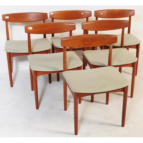 688 - Danish Modern Design - Mid century dining room table and chairs. The suite comprising an extending d... 