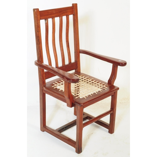 689 - A mid century walnut twin door filing cabinet. The desk raised on a plinth base with pedestal having... 