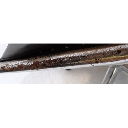 698 - A pair of vintage mid 20th century metal and leatherette chrome office swivel desk chairs. Having a ... 