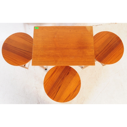 699 - A retro mid 20th century Danish inspired teak nest of table. Poul Hundevad manner. Rectangular form ... 
