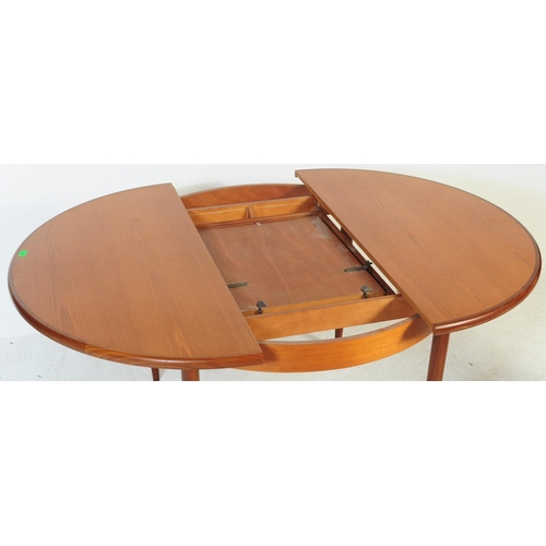 700 - G Plan Furniture - Fresco Range - A retro mid 20th century G Plan teak extending dining table. Of ci... 