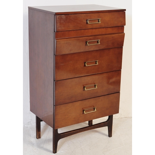 703 - Meredew Furniture - A retro 20th Century 1970's walnut veneered pedestal upright chest of drawers ha... 