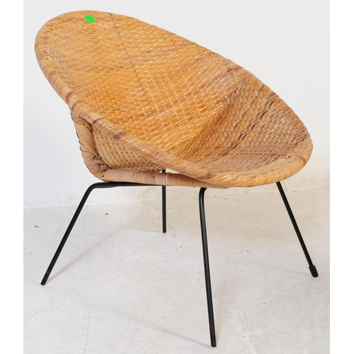 715 - A pair of retro 20th Century wicker cane satellite chairs in the manner of Franco Albini. The circle... 