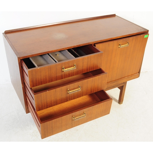 645 - A retro mid 20th Century British design teak wood sideboard credenza having a bank of three drawers ... 