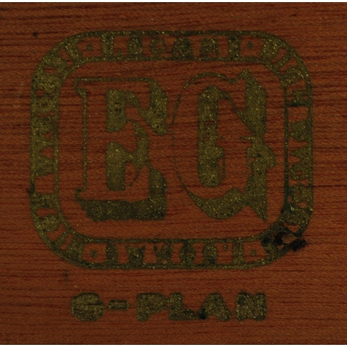 645 - A retro mid 20th Century British design teak wood sideboard credenza having a bank of three drawers ... 