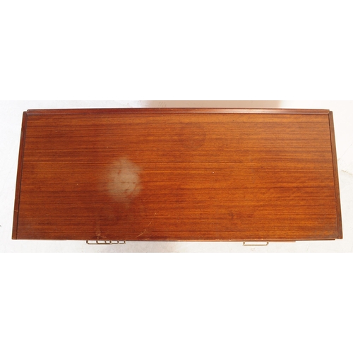 645 - A retro mid 20th Century British design teak wood sideboard credenza having a bank of three drawers ... 