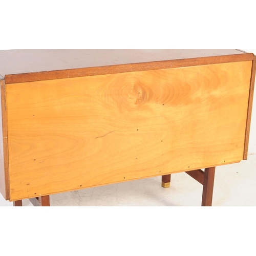 645 - A retro mid 20th Century British design teak wood sideboard credenza having a bank of three drawers ... 