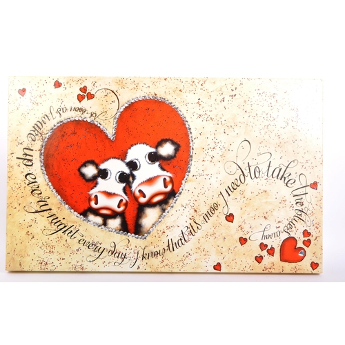 651 - 2009 canvas, Caroline Shotton tries a different approach to her love of cows in this limited edition... 