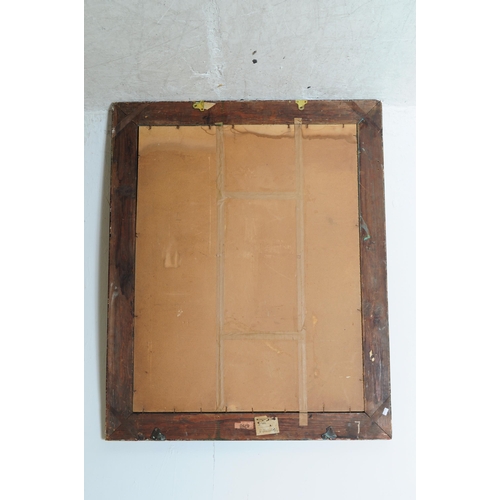 656 - A 20th century silvered and green painted frame mirror. The mirror with cushioned frame having a sil... 