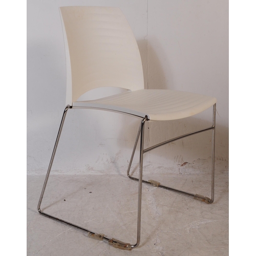 696 - Frovi - A set of three mid 20th century canteen / bistro / café dining chairs. Having moulded white ... 