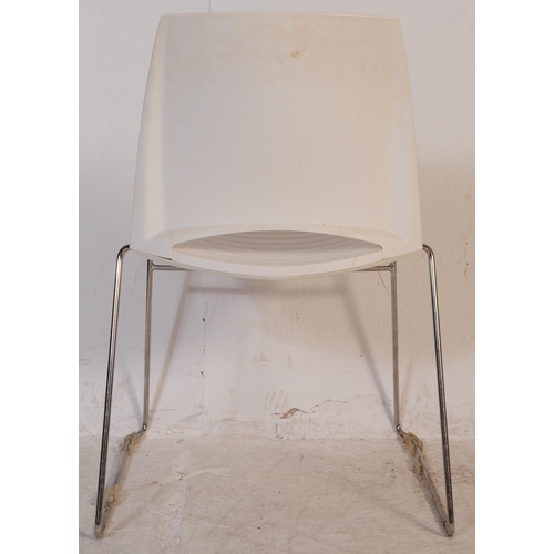 696 - Frovi - A set of three mid 20th century canteen / bistro / café dining chairs. Having moulded white ... 